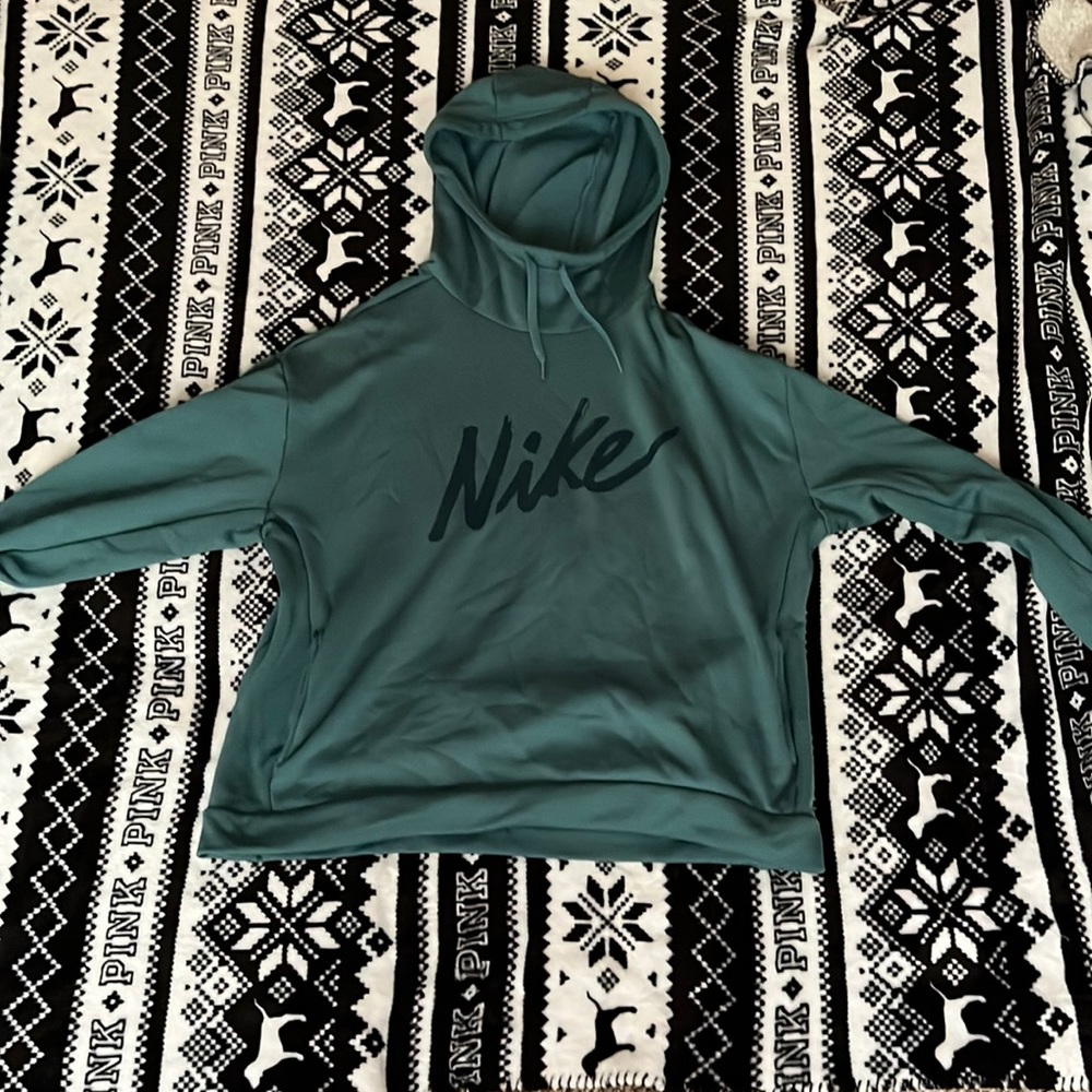 Teal Nike sweatshirt but it’s a little cropped. Too big for me